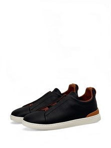 {{photo.Alt || photo.Description || 'Ermenegildo Zegna кожаные кеды на коричневых резинках с белой подошвой и коричневой пяткой'}}