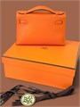 HERMES клатч POCHETTE 22 см оранжевая кожа свифт золото СК-00395