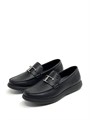 TODS Лоферы черные с перемычкой и буквой Т в серебре на толстой шипованной подошве ОК-2133