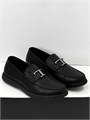 TODS Лоферы черные с перемычкой и буквой Т в серебре на толстой шипованной подошве ОК-2133