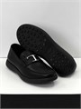 TODS Лоферы черные с перемычкой и буквой Т в серебре на толстой шипованной подошве ОК-2133